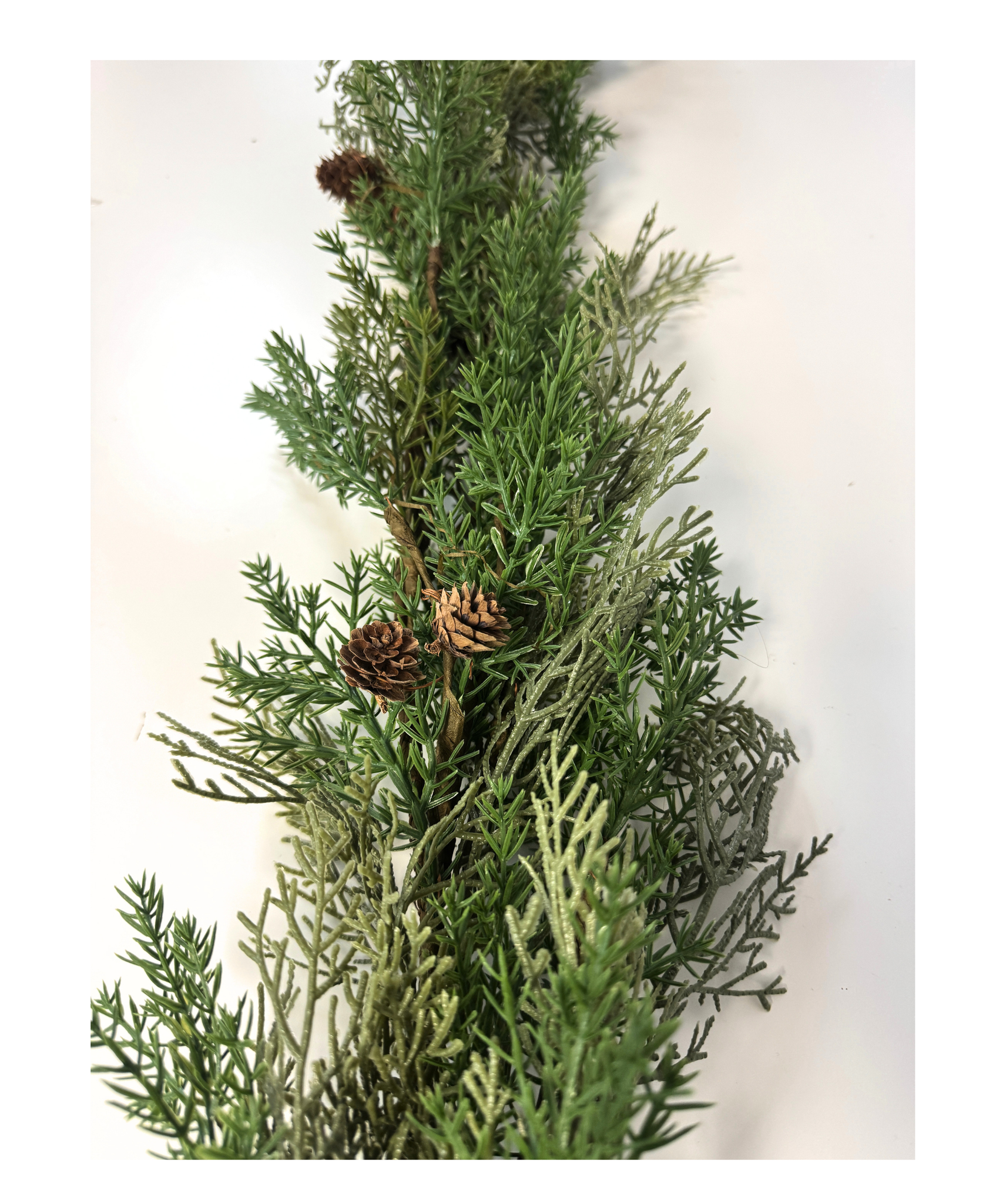 Green Garland With Pine Cones