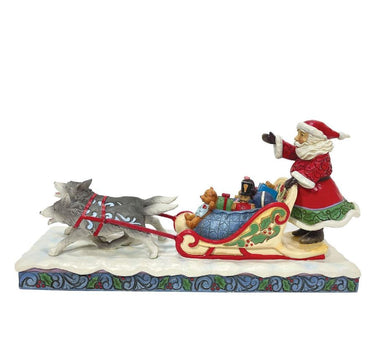 Jim Shore Dog Sledding Santa Figurine