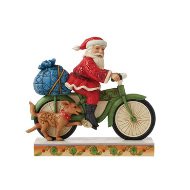 Jim Shore Santa Riding Bicycle Figurine